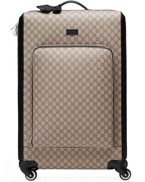 white gucci suitcase